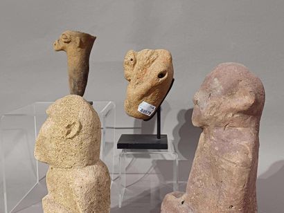 Lot of four West African objects: a seated...