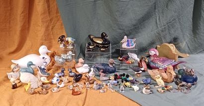 Collection of figurines representing birds...