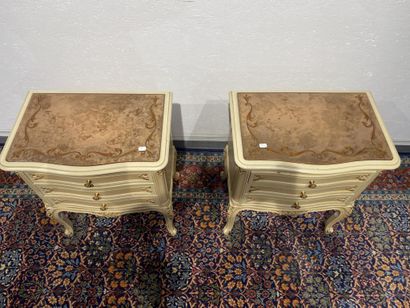 Pair of molded, carved and lacquered cream...