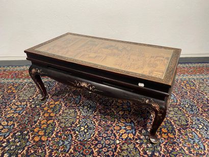 Lacquered wood coffee table with top carved...