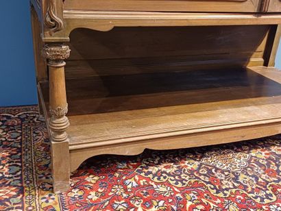 Wooden sideboard carved with flowers, the...