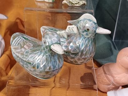Collection of figurines representing birds...