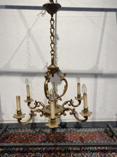 Gilded metal chandelier with six arms of...