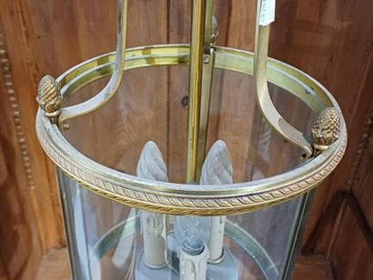 Brass and glass three-light lantern.
Louis...