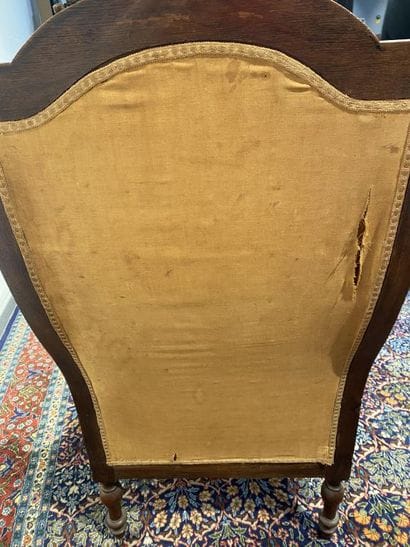 Oak armchair with carved Indian head, lion's...