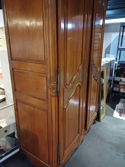 Large cabinet in molded and carved cherrywood,...