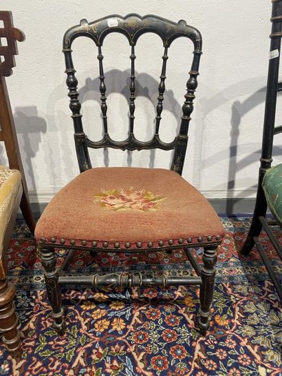 Set comprising three children's chairs with...