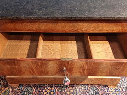 Chest of drawers in mahogany and flamed mahogany...