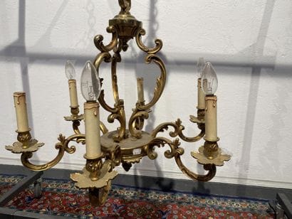 Gilded metal chandelier with six arms of...