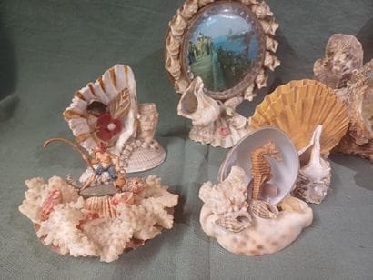 Set of sixteen decorative elements and souvenirs...