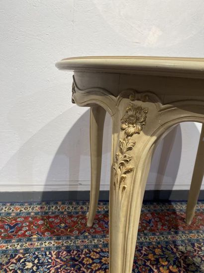 Round table in molded, carved and cream and...
