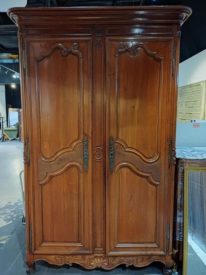Large cabinet in molded and carved cherrywood,...