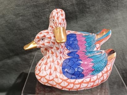 Collection of figurines representing birds...