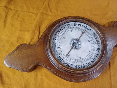 Baromètre-Thermomètre en placage d'acajou...