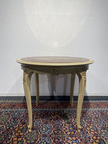 Round table in molded, carved and cream and...