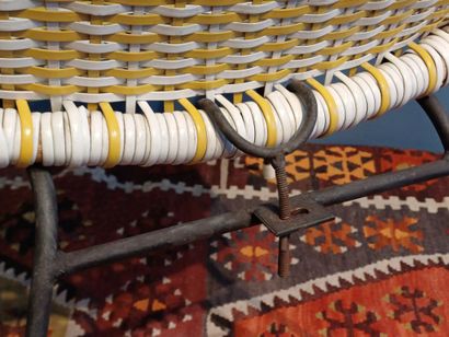 Yellow and white woven plastic armchair,...