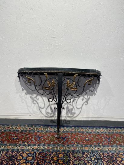 Partially gilded wrought-iron console decorated...