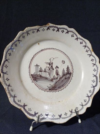 NEVERS
Two earthenware scalloped rim plates,...
