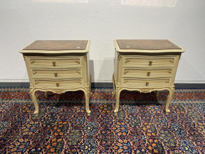 Pair of molded, carved and lacquered cream...