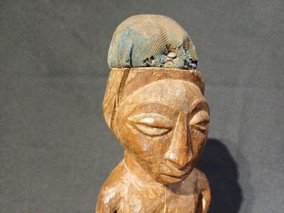 Carved wooden fetish.
Republic of Congo,...