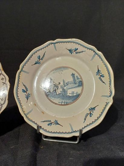 NEVERS
Two earthenware scalloped rim plates,...