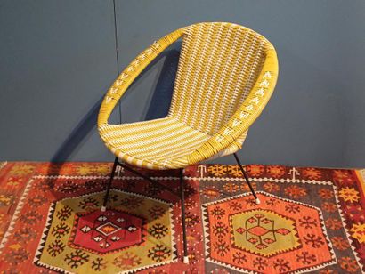 Yellow and white woven plastic armchair,...
