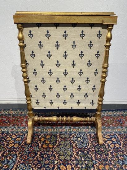 Gilded turned wood fire screen with fleur-de-lis...