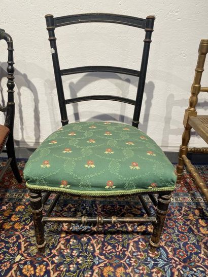Set comprising three children's chairs with...