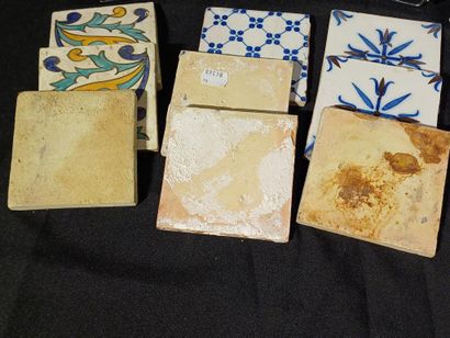 Set of 14 earthenware tiles with blue or...