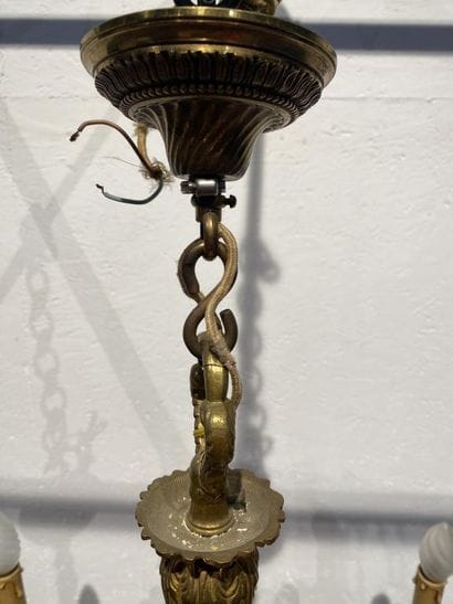 Gilded bronze eight-light chandelier decorated...