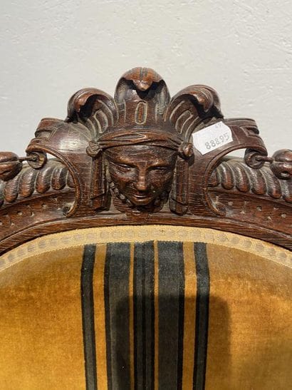 Oak armchair with carved Indian head, lion's...