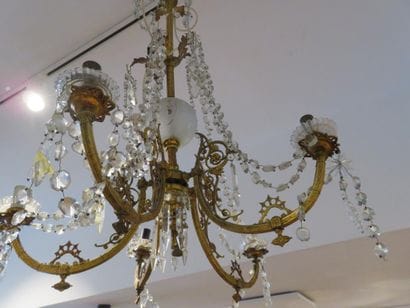 Brass chandelier with five foliate scrolled...