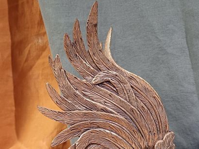 Two roosters facing each other with outstretched...