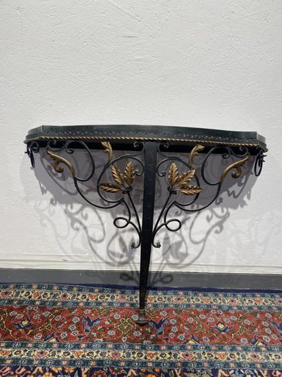Partially gilded wrought-iron console decorated...