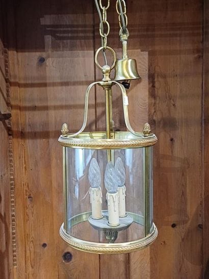 Brass and glass three-light lantern.
Louis...