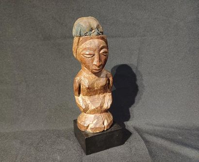 Carved wooden fetish.
Republic of Congo,...