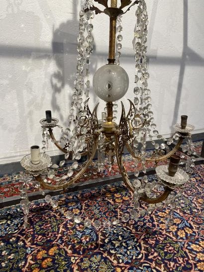 Brass chandelier with five foliate scrolled...
