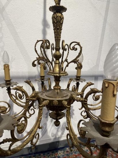 Gilded bronze eight-light chandelier decorated...