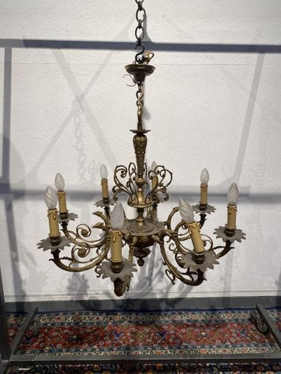 Gilded bronze eight-light chandelier decorated...