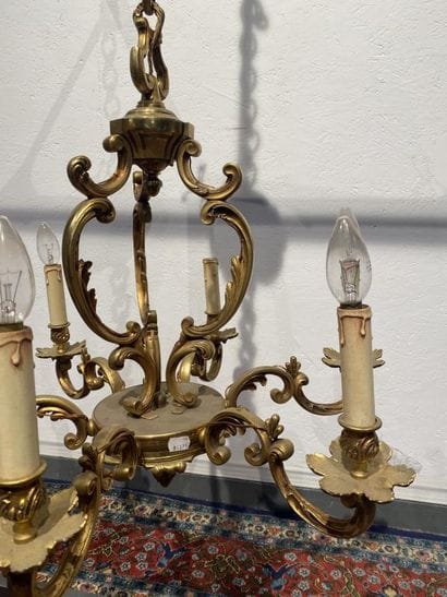 Gilded metal chandelier with six arms of...