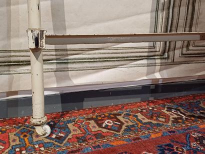 White lacquered metal and brass bed with...