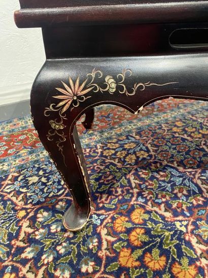 Lacquered wood coffee table with top carved...