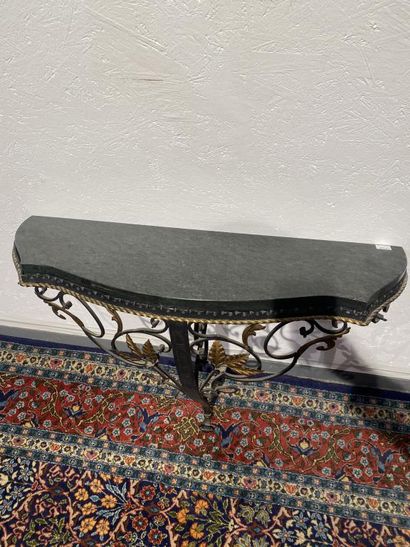 Partially gilded wrought-iron console decorated...