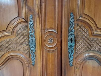Large cabinet in molded and carved cherrywood,...