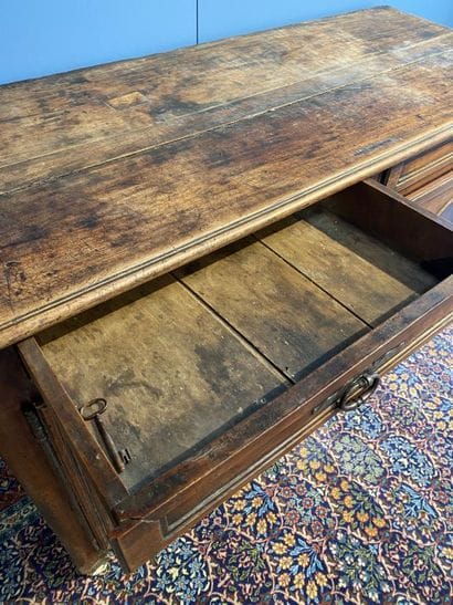 Moulded natural wood sideboard opening to...