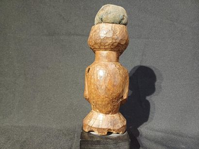 Carved wooden fetish.
Republic of Congo,...