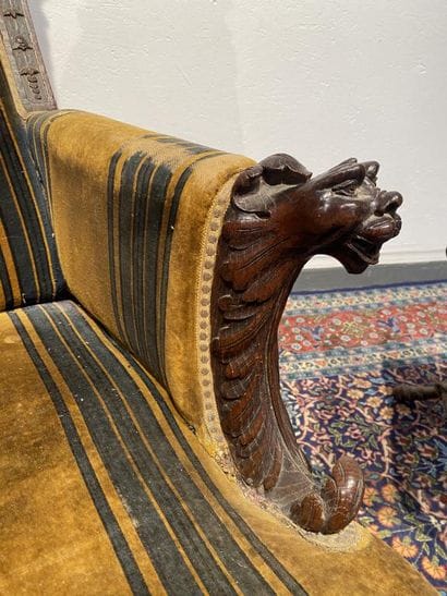 Oak armchair with carved Indian head, lion's...