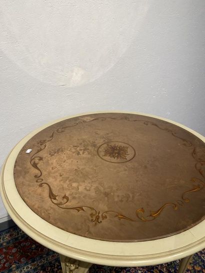 Round table in molded, carved and cream and...