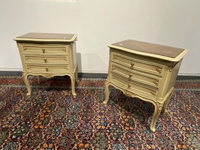 Pair of molded, carved and lacquered cream...