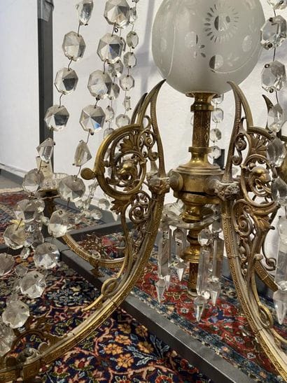 Brass chandelier with five foliate scrolled...